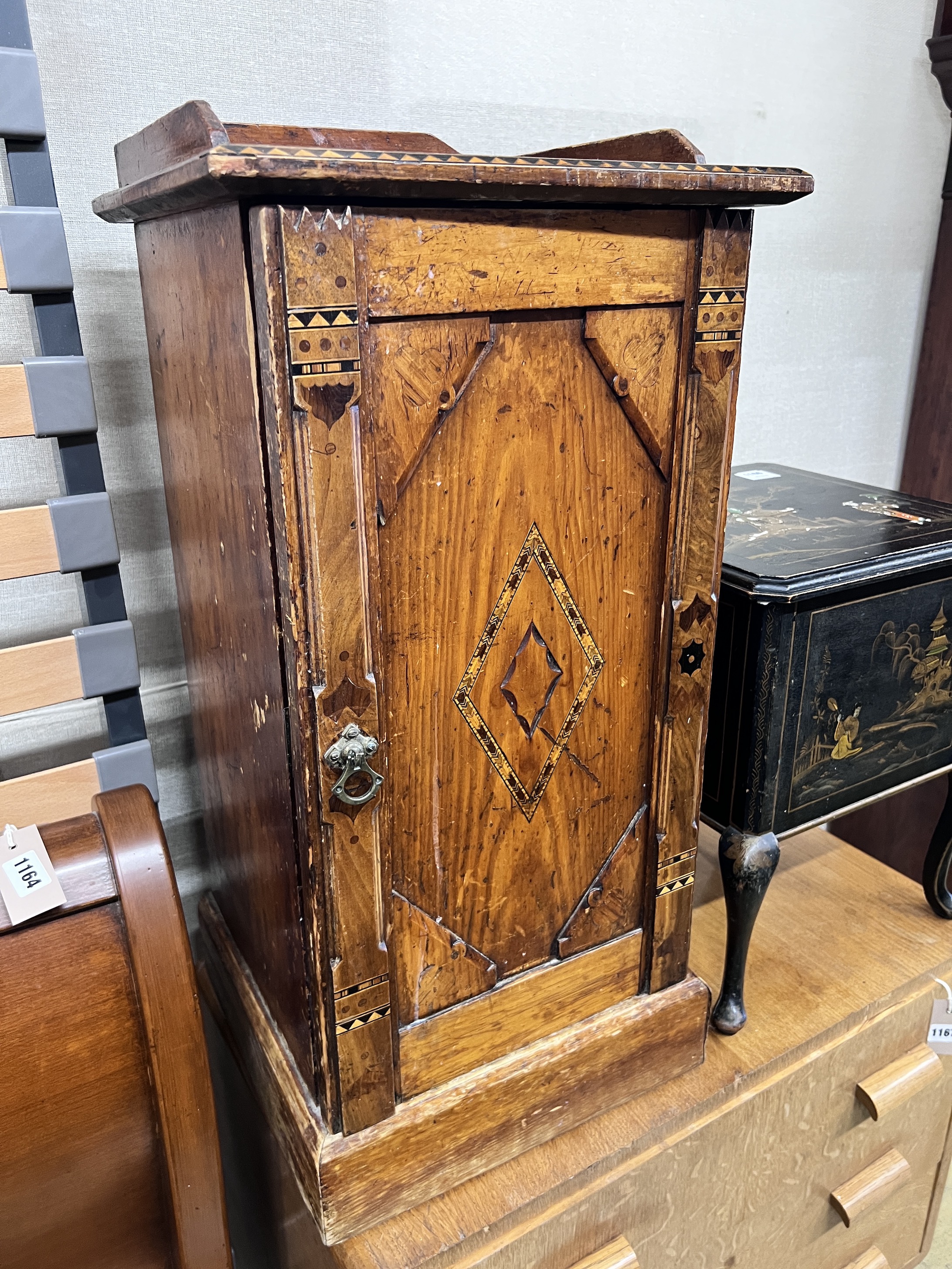 A late Victorian inlaid pine bedside cabinet, width 38cm